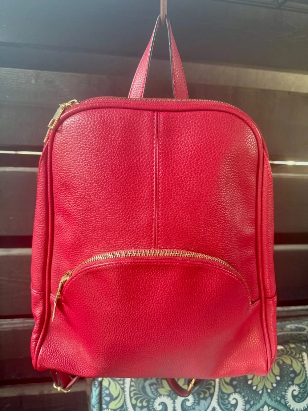 Pebbled Red Women's Leather (?) Backpack with Gold Hardware